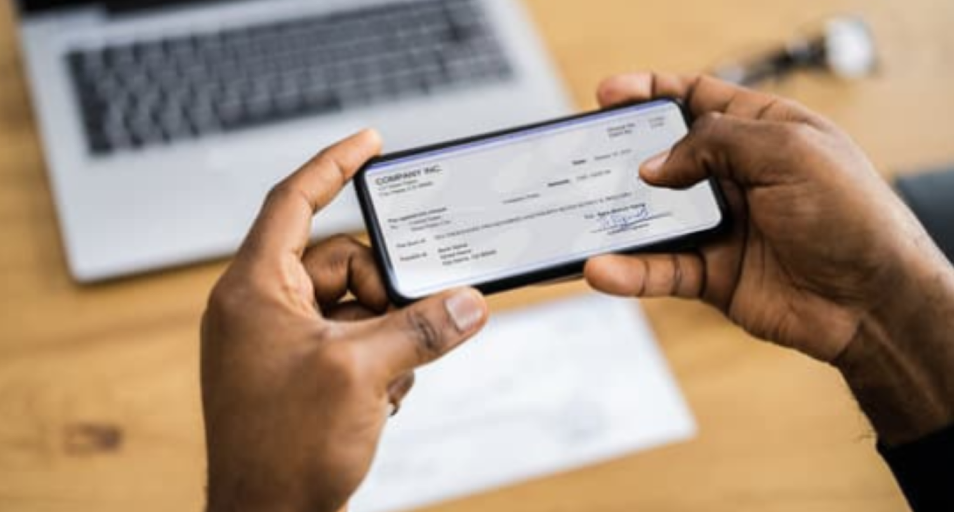 phone taking a picture of a check for mobile deposit
